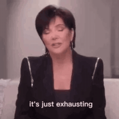 A Woman In A Black Jacket Is Sitting On A Couch And Saying `` It 'S Just Exhausting '' GIF
