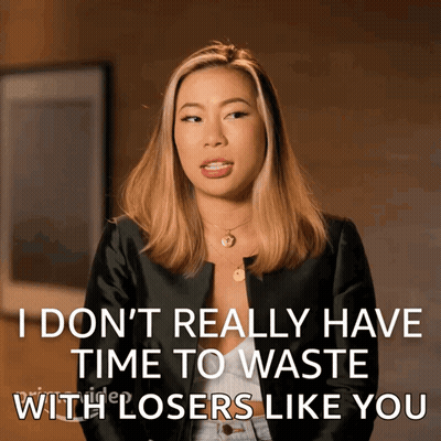 A Woman In A Black Jacket Says I Don T Really Have Time To Waste With Losers Like You GIF