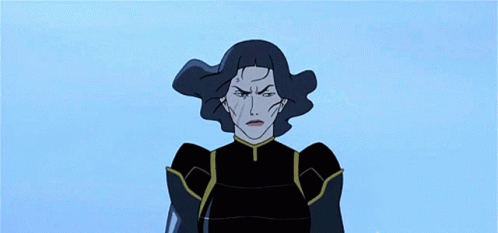 A Woman In A Black Outfit Is Standing On Top Of A Building GIF