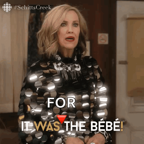 A Woman In A Black Sequined Dress Says " For It Was The Bebe " GIF