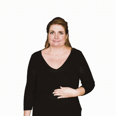 A Woman In A Black Shirt Holds Her Hand To Her Belly And The Words Mmmmhhh Are Above Her GIF