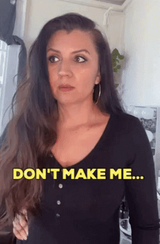 A Woman In A Black Shirt Says Do N't Make Me ... GIF