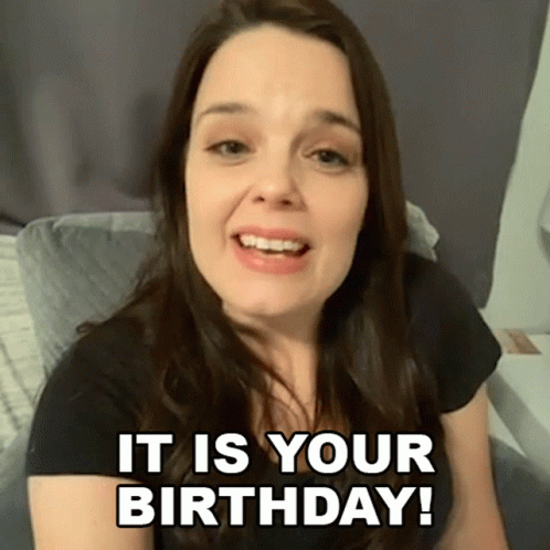 A Woman In A Black Shirt Says It Is Your Birthday . GIF