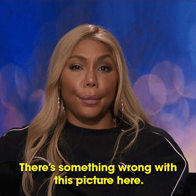 A Woman In A Black Shirt Says " There 'S Something Wrong With This Picture Here " GIF