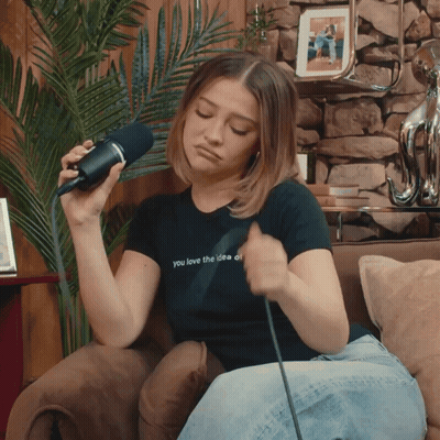 A Woman In A Black Shirt That Says You Love The Idea Of GIF