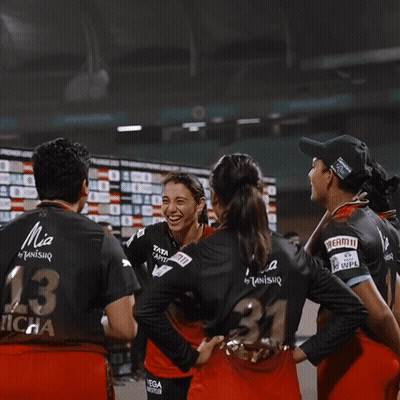 A Woman In A Black Shirt With The Number 31 On The Back GIF