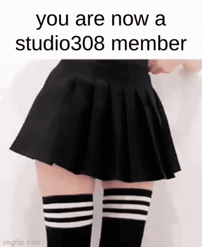 A Woman In A Black Skirt And Striped Knee High Socks GIF
