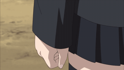 A Woman In A Black Skirt Holds Another Woman 'S Hand In A Close Up GIF