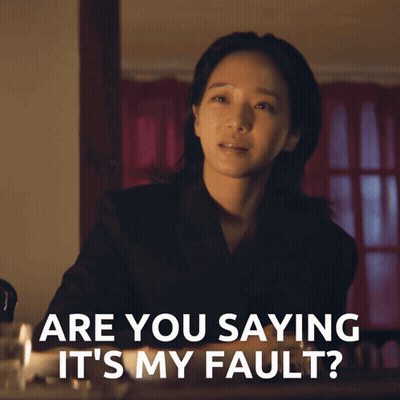 A Woman In A Black Suit Says Are You Saying It 'S My Fault GIF