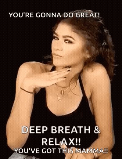 A Woman In A Black Tank Top Is Holding Her Hand To Her Chin And Says `` You 'Re Gonna Do Great ! '' GIF