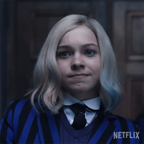 A Woman In A Blue And Black Striped Shirt And Tie Says I Know Right Netflix GIF