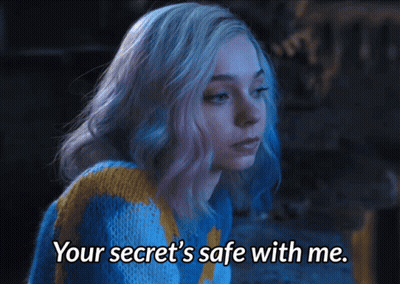 A Woman In A Blue And Yellow Sweater Says " Your Secret 'S Safe With Me " GIF