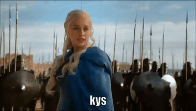 A Woman In A Blue Cape Is Standing In Front Of A Crowd Of Soldiers And The Word Kys Is On The Bottom GIF