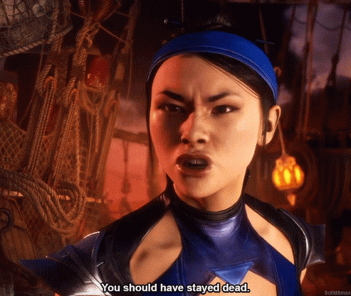 A Woman In A Blue Costume Says You Should Have Stayed Dead GIF