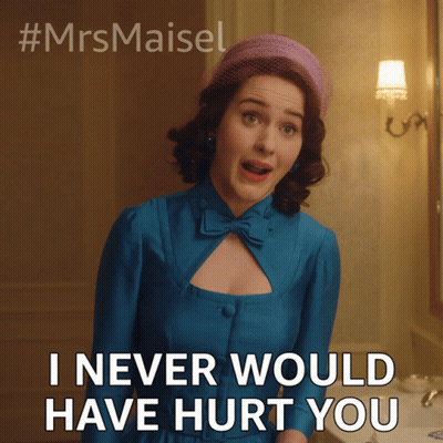 A Woman In A Blue Dress And A Pink Hat Says I Never Would Have Hurt You GIF