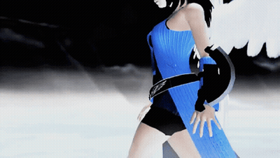 A Woman In A Blue Dress And Black Shorts Is Standing In The Dark GIF