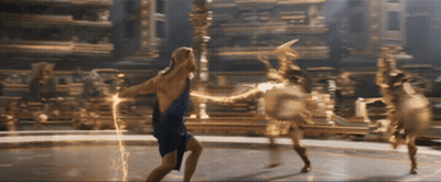 A Woman In A Blue Dress Holds A Lightning Bolt In Her Hand GIF