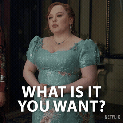 A Woman In A Blue Dress Is Asking " What Is It You Want " GIF