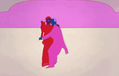 A Woman In A Blue Dress Is Dancing In Front Of A Pink Wall GIF