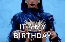 A Woman In A Blue Dress Is Holding A Crown In Her Hands And Saying `` It 'S My Birthday '' . GIF