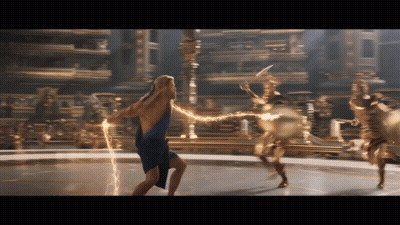 A Woman In A Blue Dress Is Holding A Lightning Bolt In Her Hands GIF