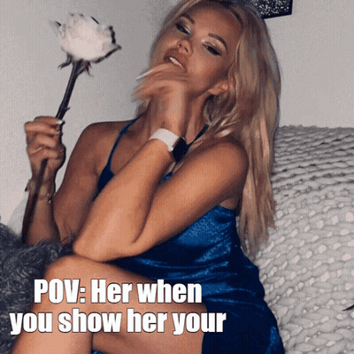 A Woman In A Blue Dress Is Holding A White Rose And The Caption Says Pov Her When You Show Her Your GIF