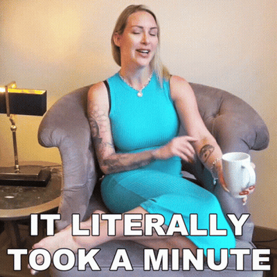 A Woman In A Blue Dress Is Sitting In A Chair Holding A Cup Of Coffee And Says It Literally GIF