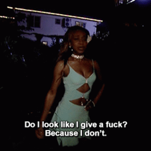 A Woman In A Blue Dress Says Do I Look Like I Give A Fuck Because I Don T GIF