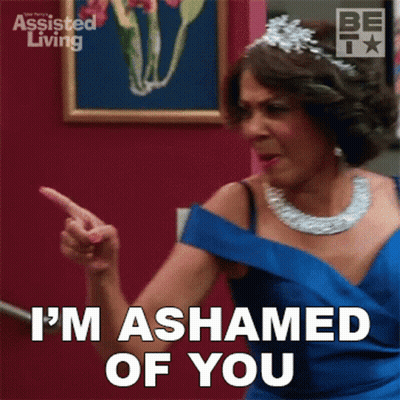 A Woman In A Blue Dress Says " I 'M Ashamed Of You " While Pointing Her Finger GIF