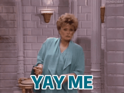 A Woman In A Blue Dress Says Yay Me In Blue Letters GIF