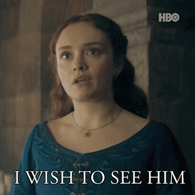 A Woman In A Blue Dress With The Words I Wish To See Him Below Her GIF