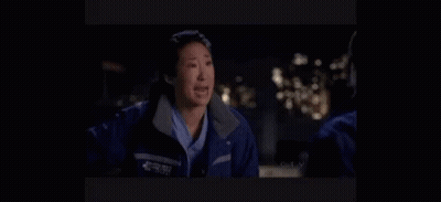 A Woman In A Blue Jacket Is Crying While Talking To Another Woman . GIF