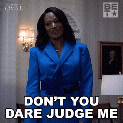 A Woman In A Blue Jacket Says " Don 'T You Dare Judge Me " GIF