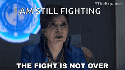 A Woman In A Blue Jacket Says I Am Still Fighting The Fight Is Not Over . GIF