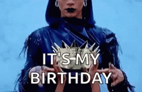 A Woman In A Blue Leather Jacket Is Holding A Crown In Her Hands And Says `` It 'S My Birthday '' . GIF