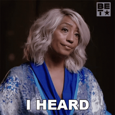 A Woman In A Blue Robe Says I Heard In White Letters GIF
