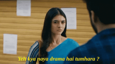 A Woman In A Blue Saree Is Looking At A Man In A Blue Shirt And Says Yeah Kya Naya Drama Hai Tumhara GIF