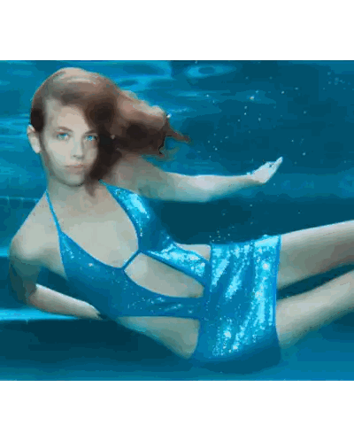 A Woman In A Blue Sequined Dress Is Swimming In A Pool Sticker