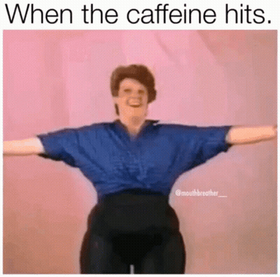 A Woman In A Blue Shirt And Black Pants Is Standing With Her Arms Outstretched In A Meme . GIF