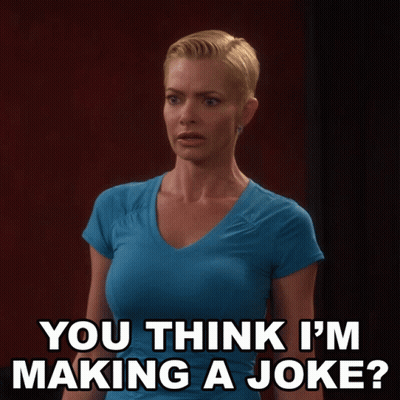 A Woman In A Blue Shirt Is Asking If She Is Making A Joke GIF