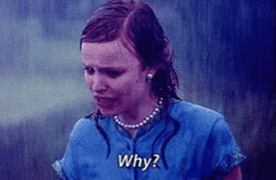 A Woman In A Blue Shirt Is Crying In The Rain And Asking Why ? GIF