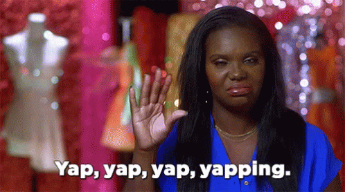 A Woman In A Blue Shirt Is Saying Yap , Yap , Yap , Yapping GIF