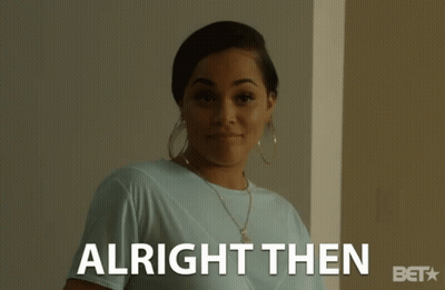 A Woman In A Blue Shirt Is Smiling And The Words Alright Then Are Behind Her GIF
