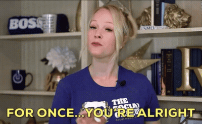 A Woman In A Blue Shirt Says " For Once You 'Re All Right " GIF