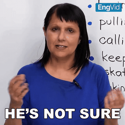 A Woman In A Blue Shirt Says He 'S Not Sure In Front Of A White Board GIF
