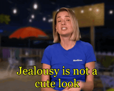 A Woman In A Blue Shirt Says " Jealousy Is Not A Cute Look " GIF