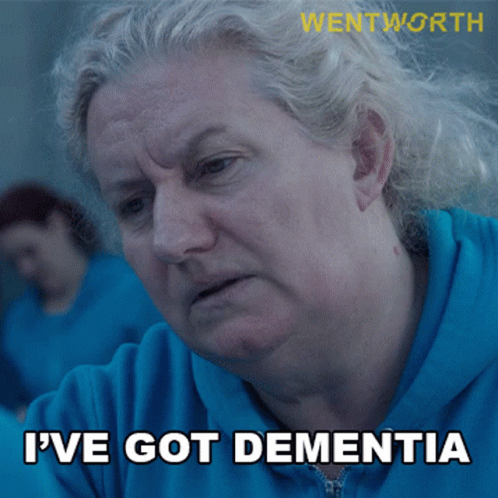 A Woman In A Blue Shirt With The Words I 'Ve Got Dementia GIF