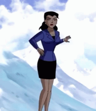 A Woman In A Blue Suit And Black Skirt Is Standing On A Snowy Hill GIF