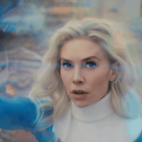 A Woman In A Blue Superhero Costume With The Number 4 GIF