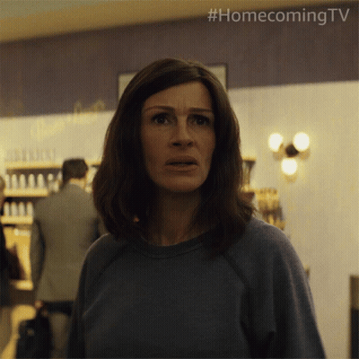 A Woman In A Blue Sweater With #Homecoming Tv On The Bottom Right GIF